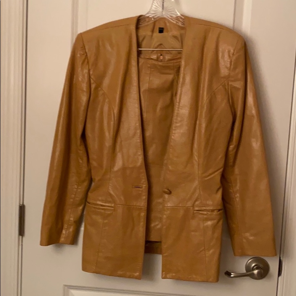 Leather jacket and mini skirt